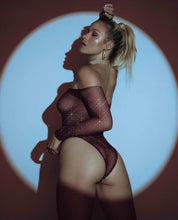 Glamorous fishnet bodysuit with rhinestones