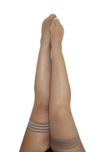 Nude fishnet thigh-highs with a non-slip grip