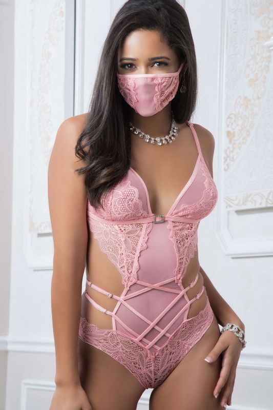 A provocative strappy bodysuit with lace mask